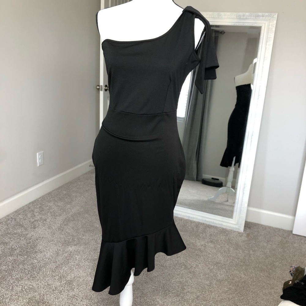 One shoulder asymmetrical dress.
